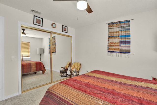 bedroom with a closet, carpet flooring, and ceiling fan