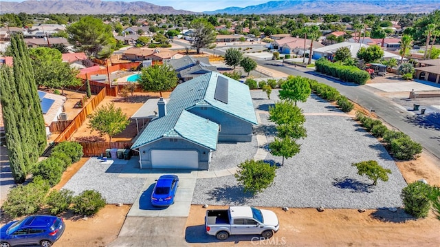 drone / aerial view featuring a mountain view