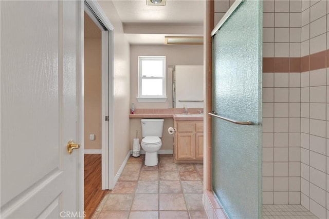 19848 Haida Rd, Apple Valley, CA 92307 - full bath with a shower stall, toilet, and vanity