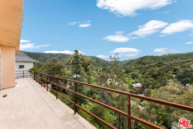 exterior space featuring a mountain view