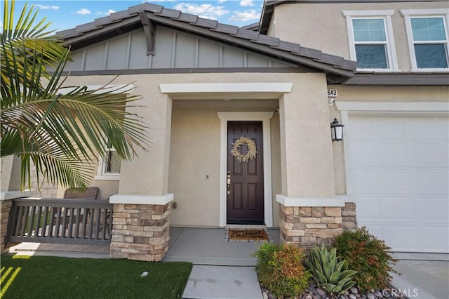 property entrance featuring a garage