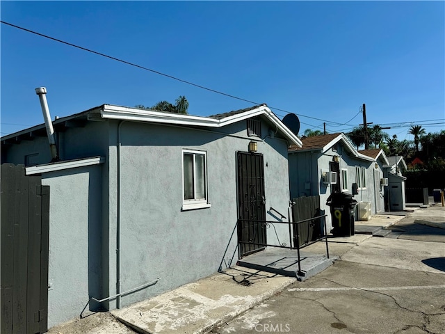 view of home's exterior with a patio