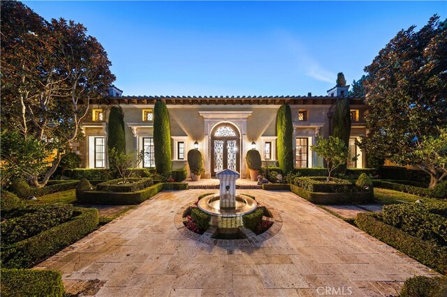 mediterranean / spanish home with french doors