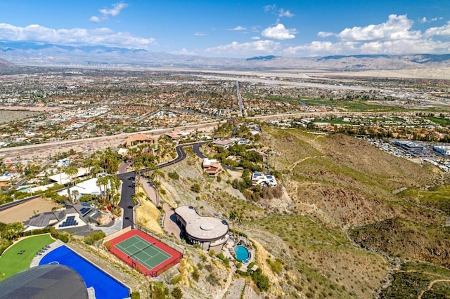 birds eye view of property featuring a mountain view