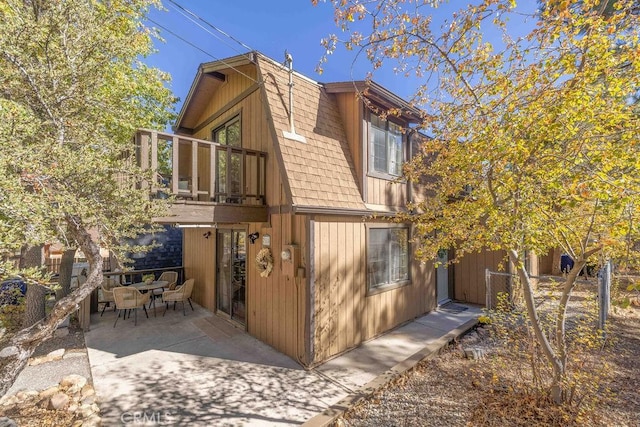 rear view of property with a patio