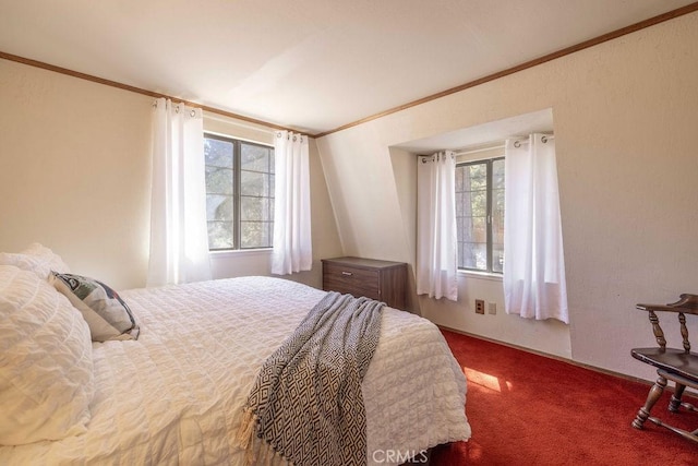 bedroom featuring dark colored carpet and ornamental molding