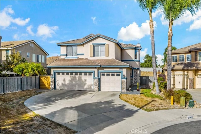 front facade with a garage