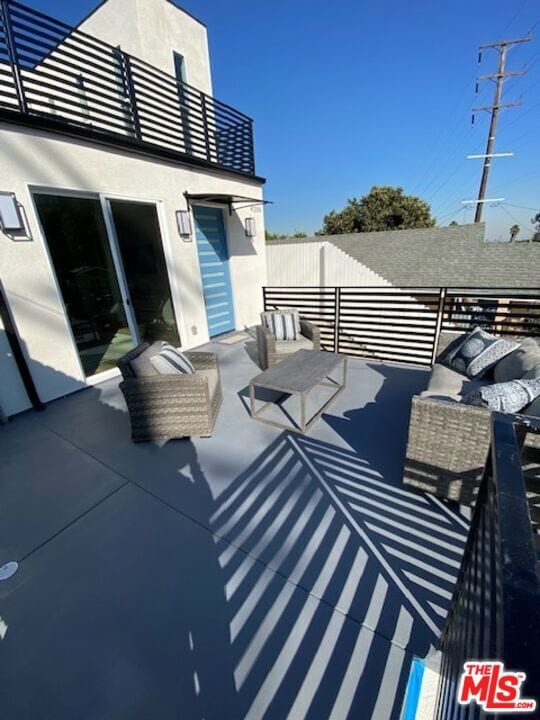 balcony featuring outdoor lounge area