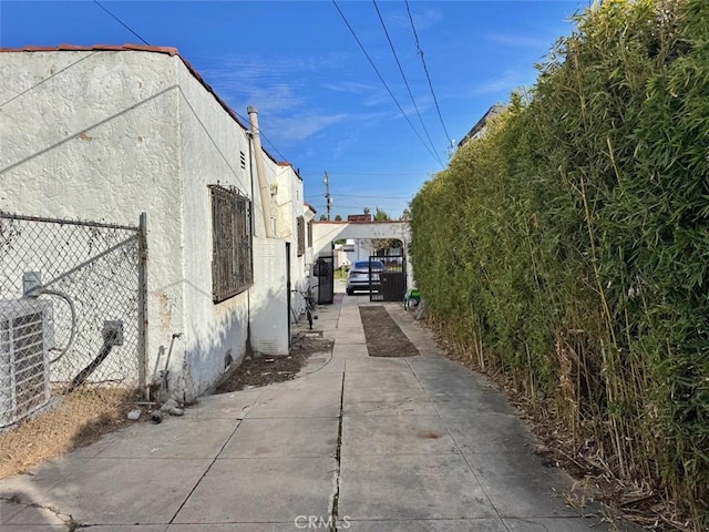 view of home's exterior with central AC