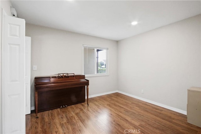 miscellaneous room featuring hardwood / wood-style flooring