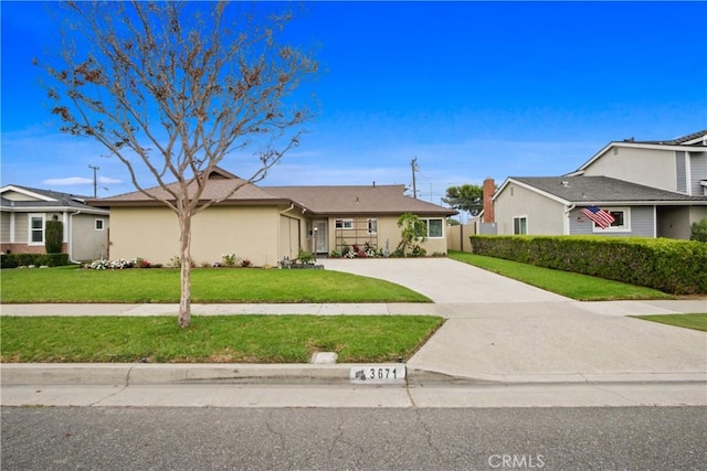 ranch-style home with a front yard