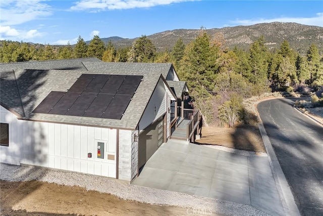 bird's eye view with a mountain view