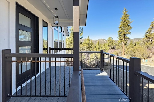 balcony featuring a mountain view