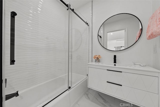 bathroom with bath / shower combo with glass door and vanity