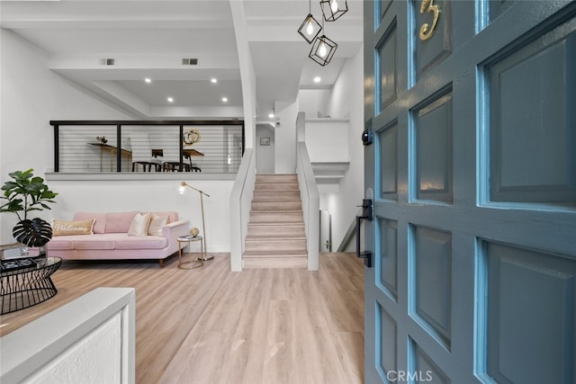 entrance foyer featuring light hardwood / wood-style floors