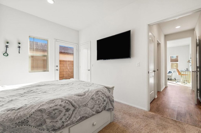 bedroom with hardwood / wood-style flooring