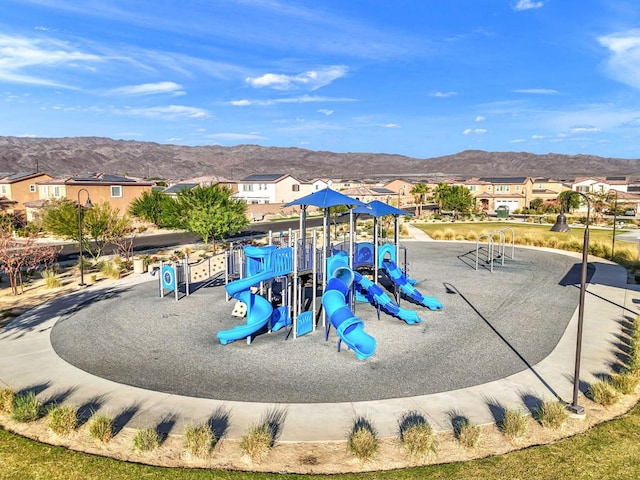 view of playground with a mountain view