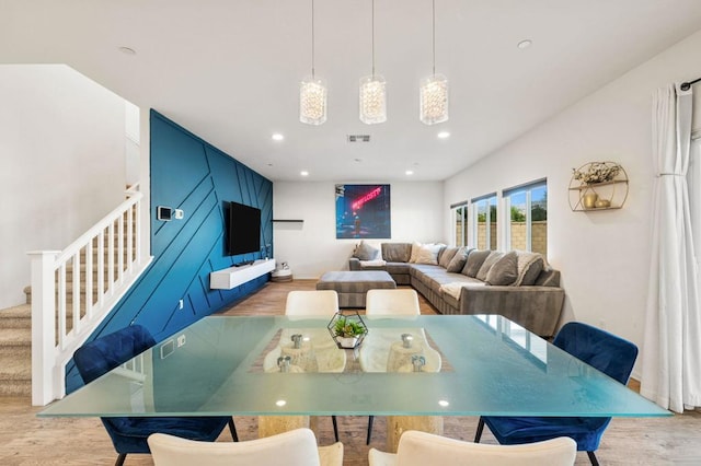 dining room with light wood-type flooring