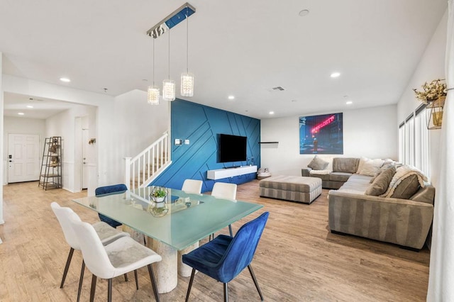 dining area with light wood-type flooring