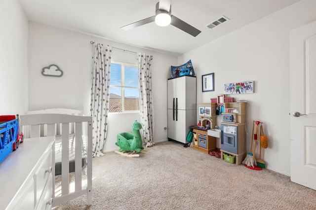 carpeted bedroom featuring ceiling fan