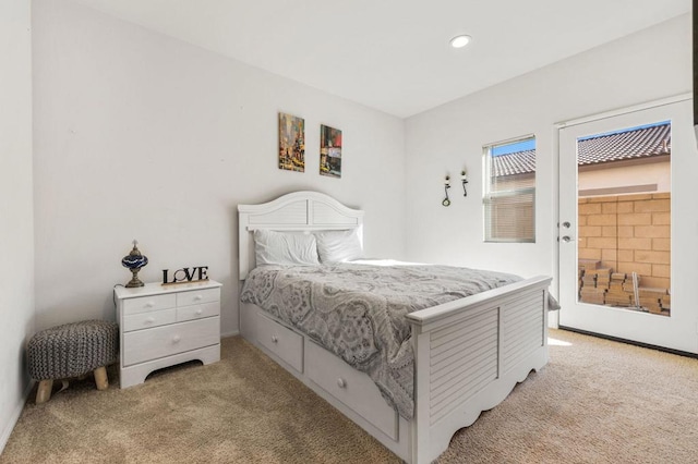 bedroom with light carpet