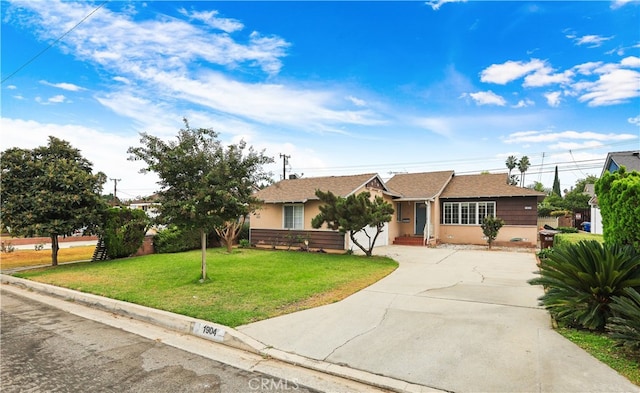 ranch-style home with a front yard