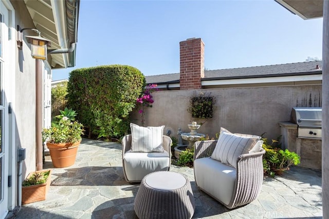 view of patio with area for grilling