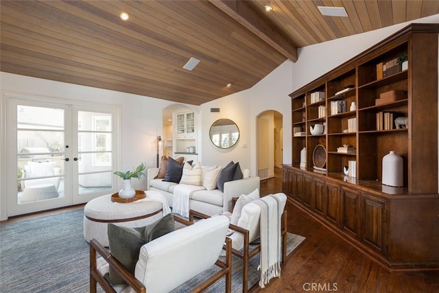 living room featuring vaulted ceiling with beams, dark hardwood / wood-style flooring, wooden ceiling, and french doors