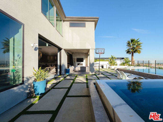 view of patio with a water view