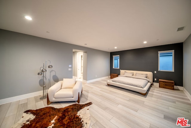 bedroom featuring light wood-type flooring