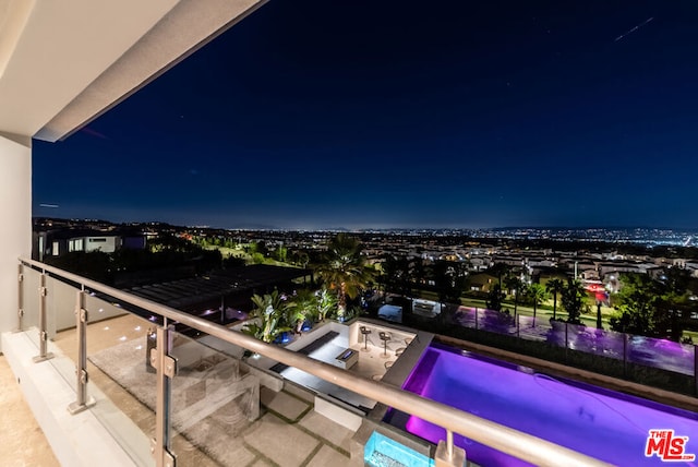 view of balcony at night