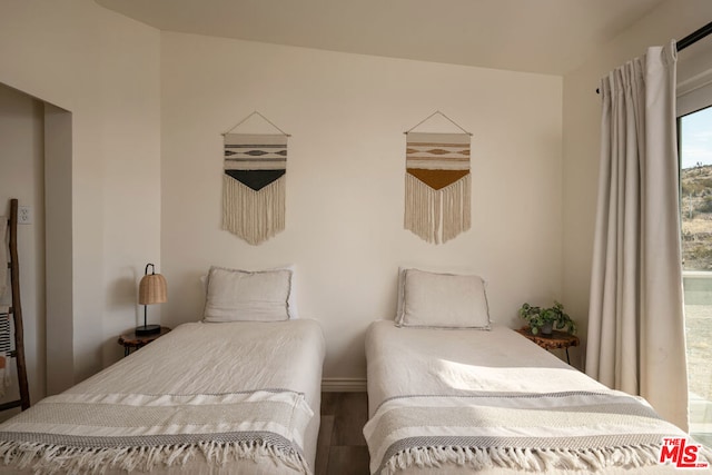 bedroom featuring hardwood / wood-style floors