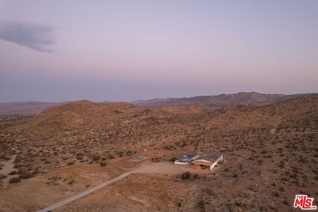 aerial view at dusk with a mountain view