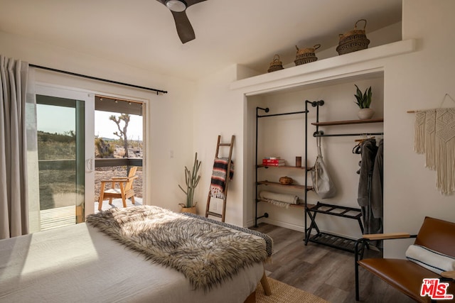 bedroom featuring ceiling fan and hardwood / wood-style floors