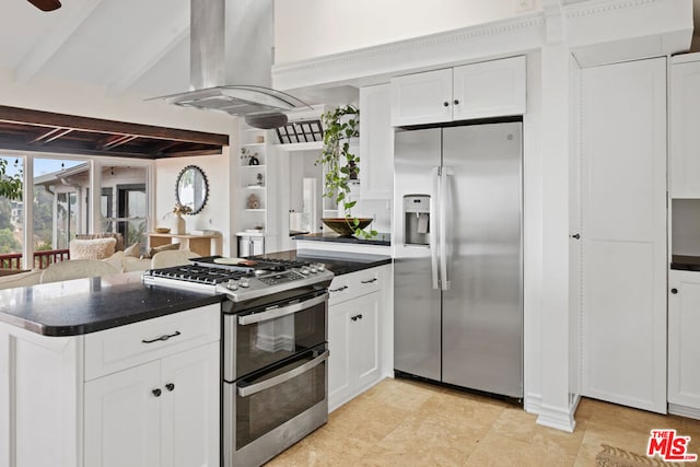 kitchen with ceiling fan, white cabinetry, beam ceiling, stainless steel appliances, and island range hood