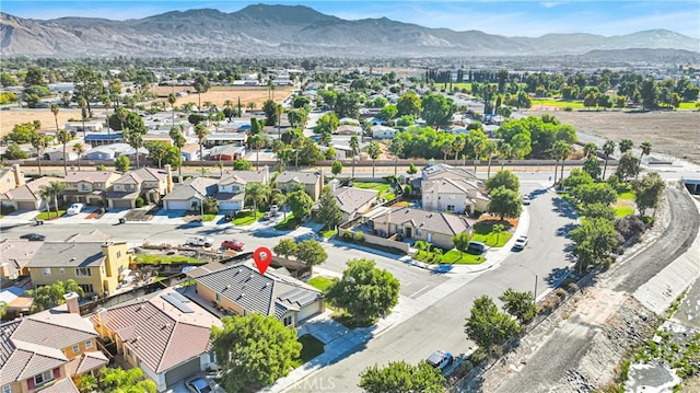 drone / aerial view featuring a mountain view