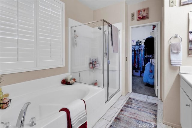 bathroom with vanity and plus walk in shower