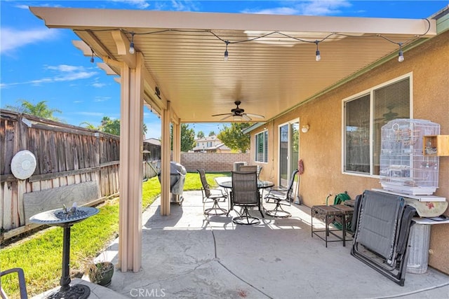 view of patio with ceiling fan