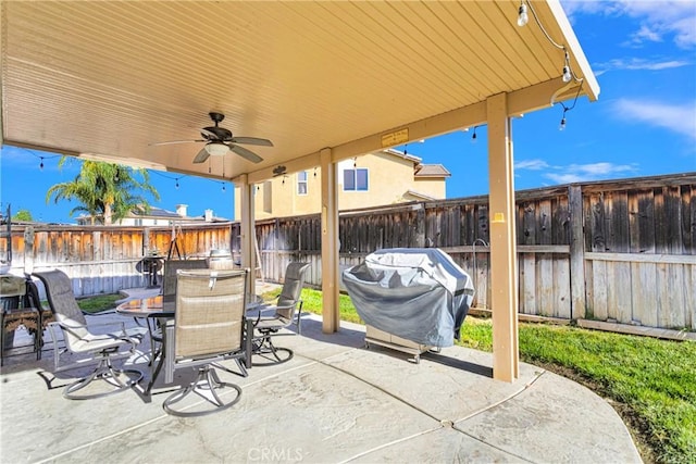 view of patio featuring ceiling fan and area for grilling