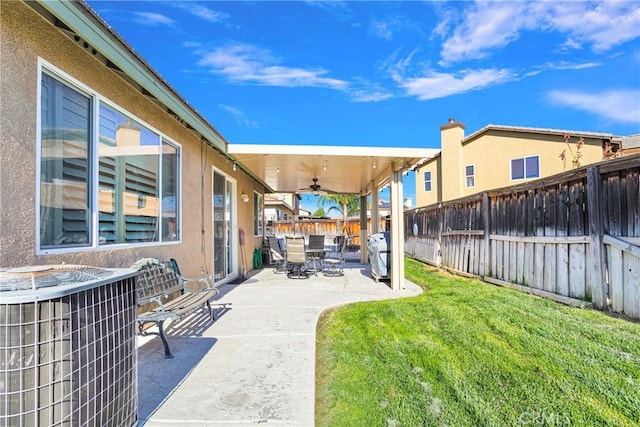 view of patio / terrace with ceiling fan and cooling unit