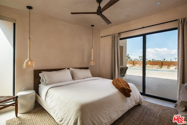 bedroom featuring ceiling fan and access to outside