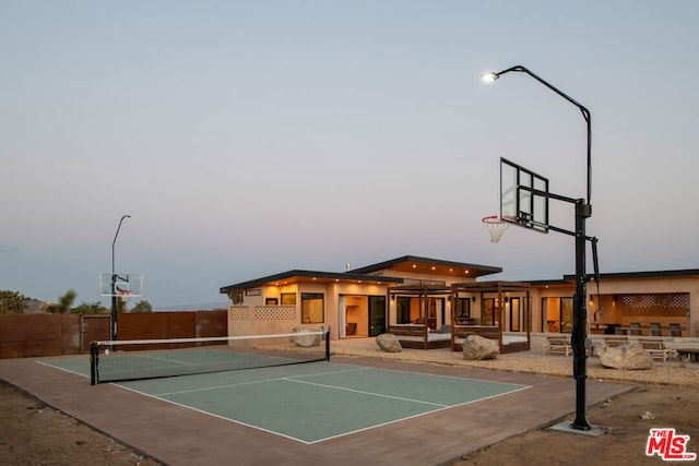 view of sport court with tennis court