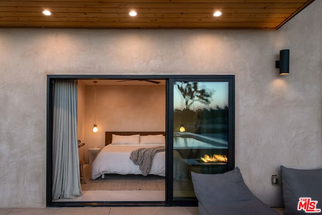 bedroom with wood ceiling