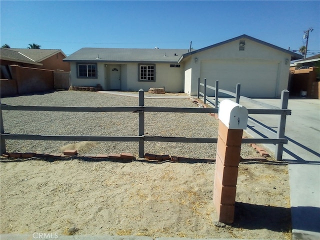 single story home with a garage