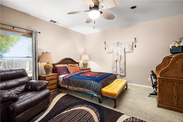 bedroom featuring ceiling fan and carpet floors