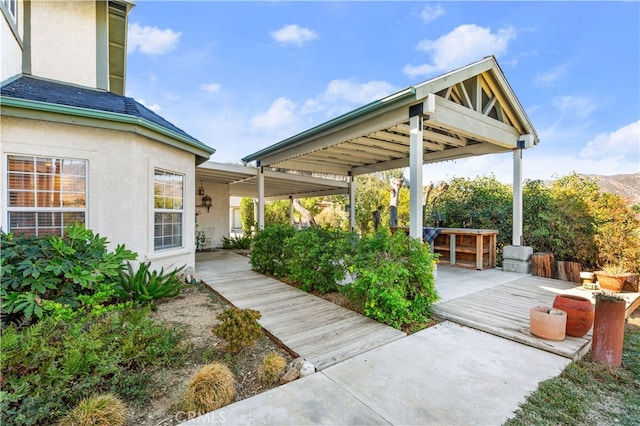 view of patio featuring a wooden deck