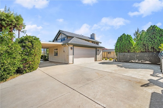 view of home's exterior with a carport