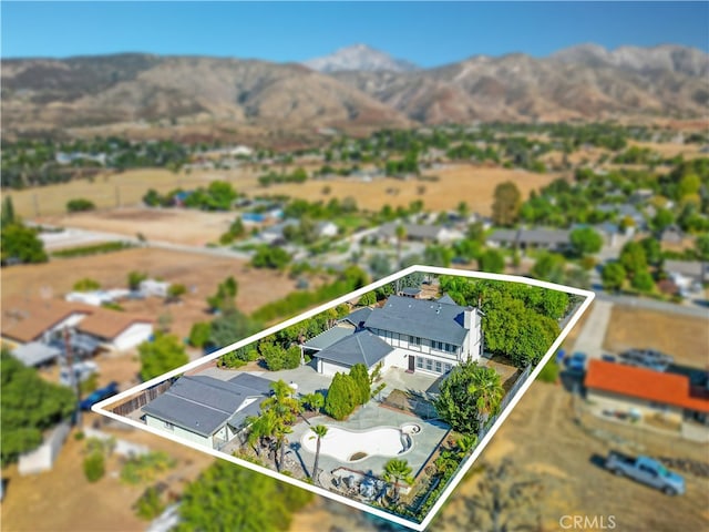 drone / aerial view featuring a mountain view