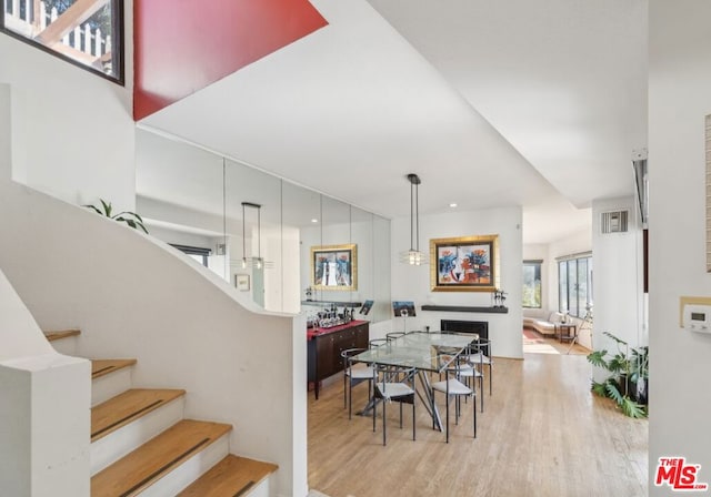 dining area with light hardwood / wood-style floors