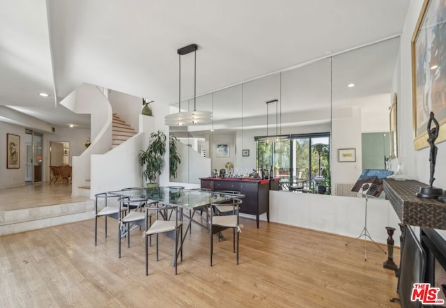 dining area featuring light wood-type flooring